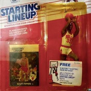 Scott pippen rookie card and action figure.